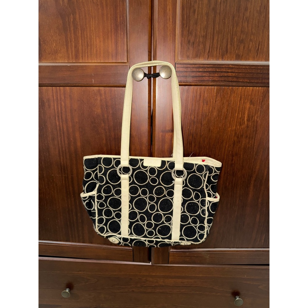 Tumi Black Cream Geometric Circle Pattern Tote Bag Leather Trim Red Lining tlc